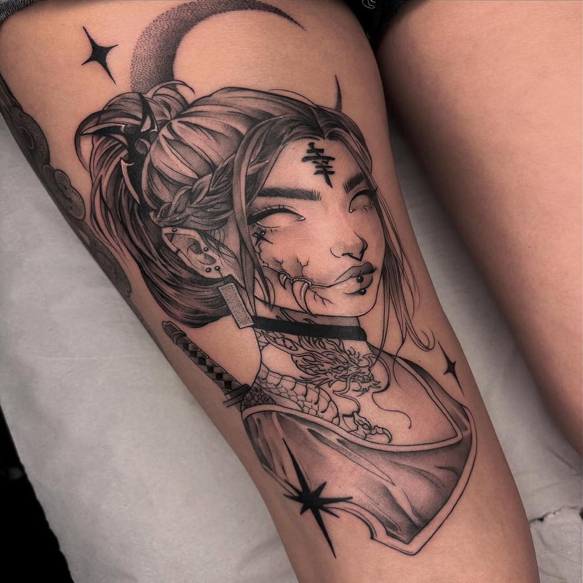 Female Thigh Tattoo